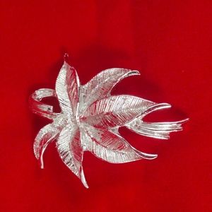 Vintage Gerry Poinsettia Pin or Brooch. Silver Christmas